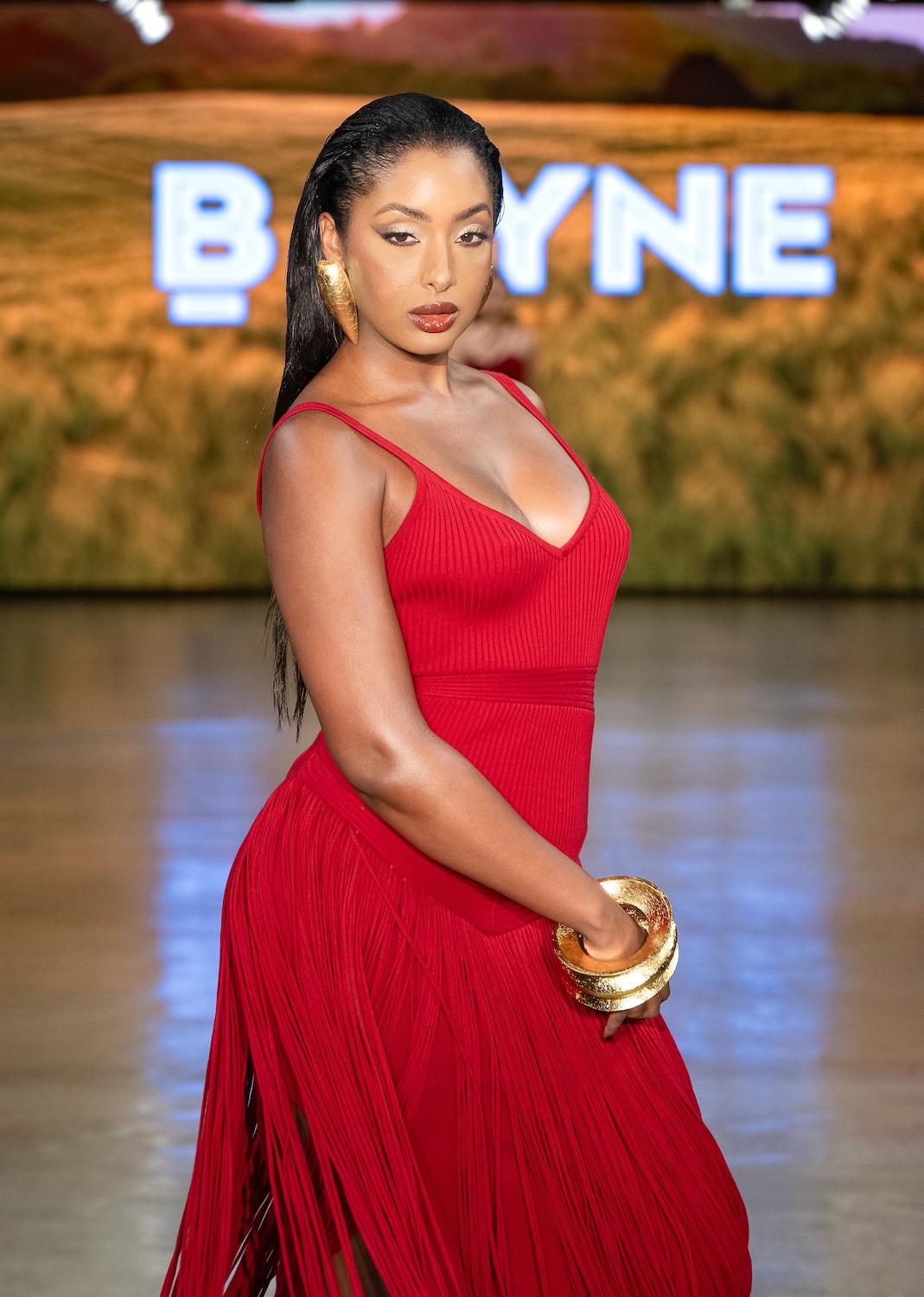 LOS ANGELES, CALIFORNIA - OCTOBER 18: A model walks the runway at the BFYNE show during Los Angeles Fashion Week Powered By Art Hearts Fashion at The New Mart on October 18, 2025 in Los Angeles, California. (Photo by Mark Gunter/Getty Images for Art Hearts Fashion)