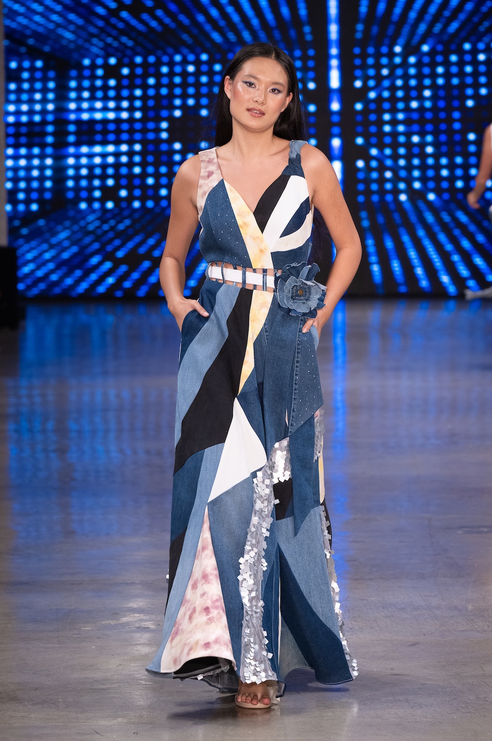 LOS ANGELES, CALIFORNIA - OCTOBER 18: A model walks the runway at the Upcycle Denim & Sustainability Project 2025 show during Los Angeles Fashion Week Powered By Art Hearts Fashion at The New Mart on October 18, 2025 in Los Angeles, California. (Photo by Mark Gunter/Getty Images for Art Hearts Fashion)