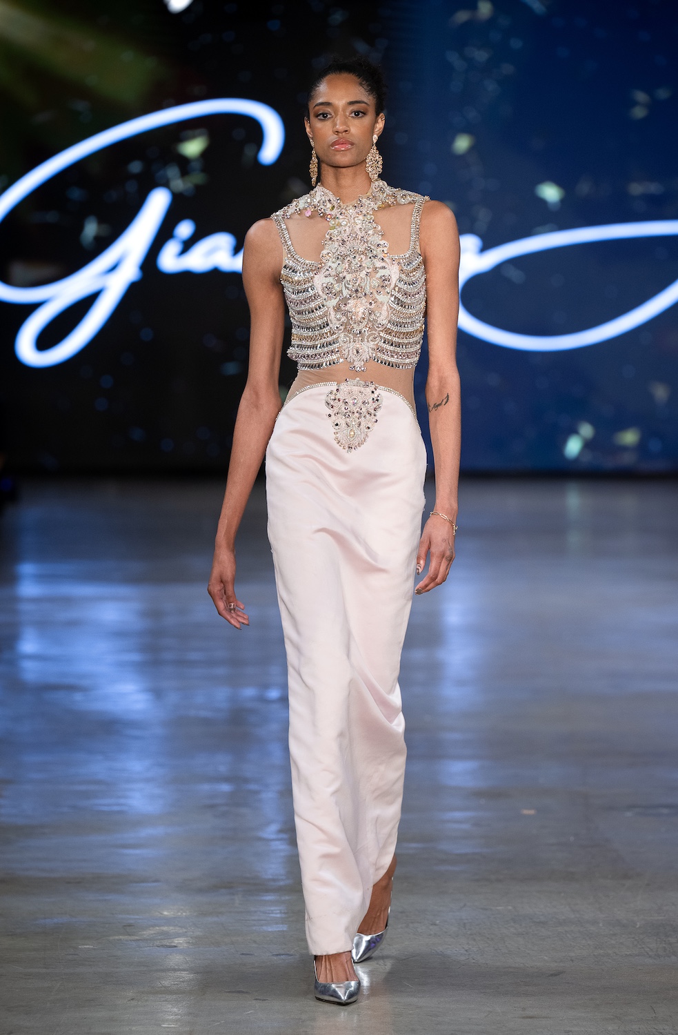LOS ANGELES, CALIFORNIA - OCTOBER 18: A model walks the runway at the Giannina Azar show during Los Angeles Fashion Week Powered By Art Hearts Fashion at The New Mart on October 18, 2025 in Los Angeles, California. (Photo by Mark Gunter/Getty Images for Art Hearts Fashion)