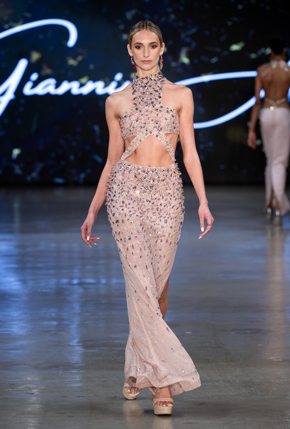 LOS ANGELES, CALIFORNIA - OCTOBER 18: A model walks the runway at the Giannina Azar show during Los Angeles Fashion Week Powered By Art Hearts Fashion at The New Mart on October 18, 2025 in Los Angeles, California. (Photo by Mark Gunter/Getty Images for Art Hearts Fashion)