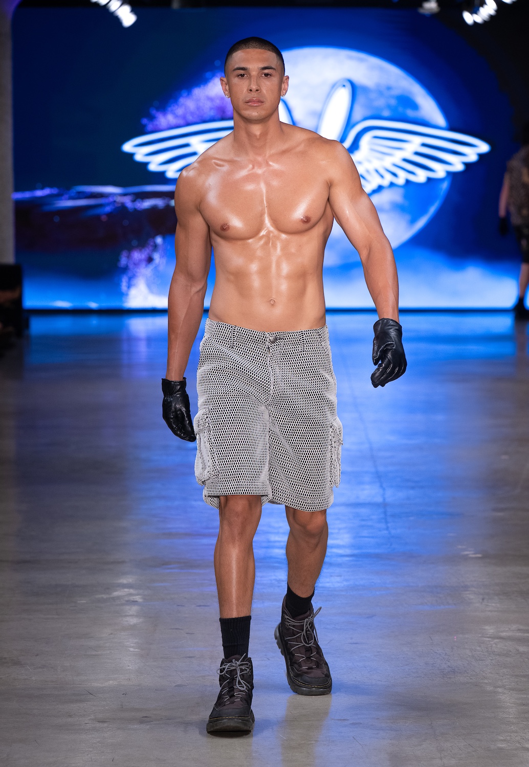 LOS ANGELES, CALIFORNIA - OCTOBER 18: Model Steve Rivera walks the runway at the Mister Triple X show during Los Angeles Fashion Week Powered By Art Hearts Fashion at The New Mart on October 18, 2025 in Los Angeles, California. (Photo by Mark Gunter/Getty Images for Art Hearts Fashion)