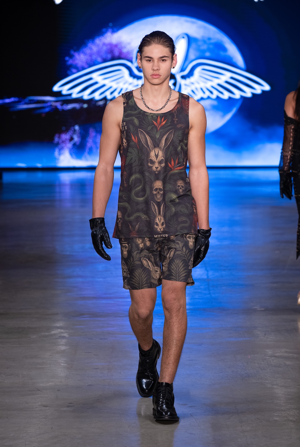 LOS ANGELES, CALIFORNIA - OCTOBER 18: Model Brayden Jacobs walks the runway at the Mister Triple X show during Los Angeles Fashion Week Powered By Art Hearts Fashion at The New Mart on October 18, 2025 in Los Angeles, California. (Photo by Mark Gunter/Getty Images for Art Hearts Fashion)