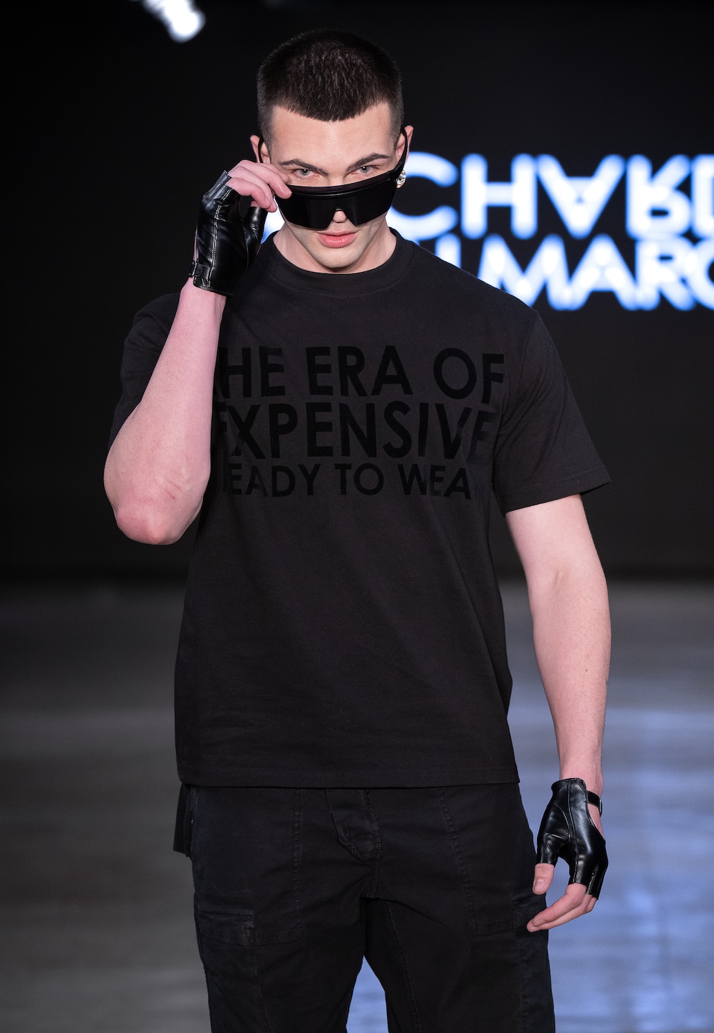LOS ANGELES, CALIFORNIA - OCTOBER 18: A model walks the runway at the Richard Hallmarq show during Los Angeles Fashion Week Powered By Art Hearts Fashion at The New Mart on October 18, 2025 in Los Angeles, California. (Photo by Mark Gunter/Getty Images for Art Hearts Fashion)