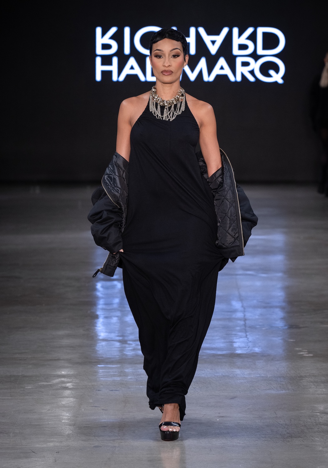LOS ANGELES, CALIFORNIA - OCTOBER 18: A model walks the runway at the Richard Hallmarq show during Los Angeles Fashion Week Powered By Art Hearts Fashion at The New Mart on October 18, 2025 in Los Angeles, California. (Photo by Mark Gunter/Getty Images for Art Hearts Fashion)