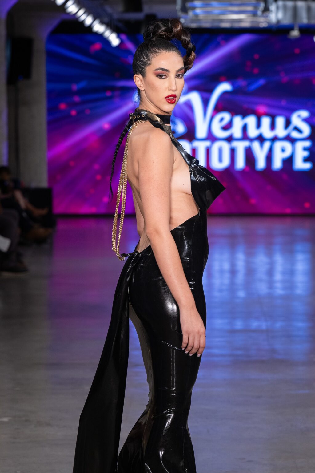 LOS ANGELES, CALIFORNIA - OCTOBER 18: A model walks the runway at the Venus Prototype show during Los Angeles Fashion Week Powered By Art Hearts Fashion at The New Mart on October 18, 2025 in Los Angeles, California. (Photo by Mark Gunter/Getty Images for Art Hearts Fashion)