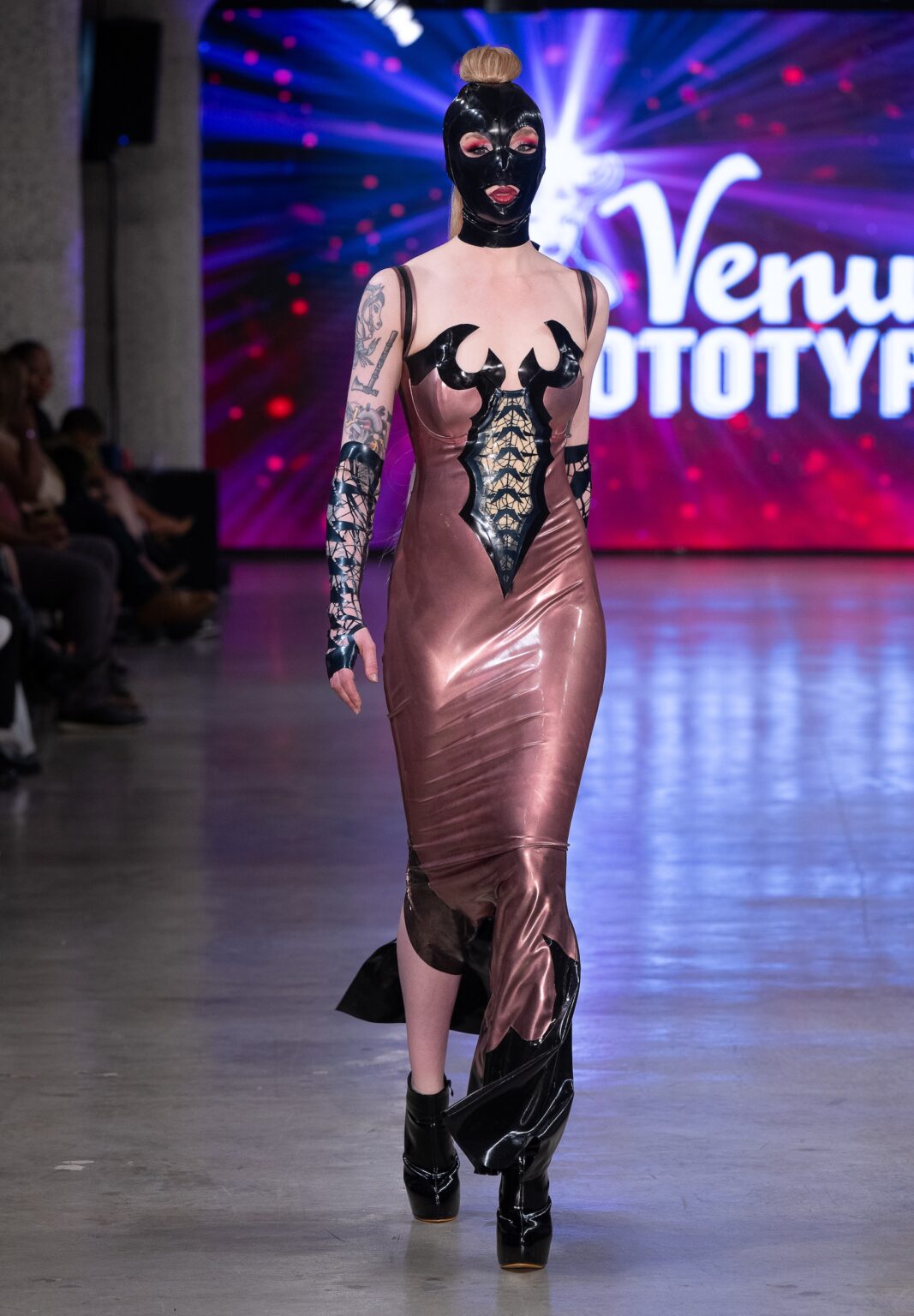 LOS ANGELES, CALIFORNIA - OCTOBER 18: A model walks the runway at the Venus Prototype show during Los Angeles Fashion Week Powered By Art Hearts Fashion at The New Mart on October 18, 2025 in Los Angeles, California. (Photo by Mark Gunter/Getty Images for Art Hearts Fashion)