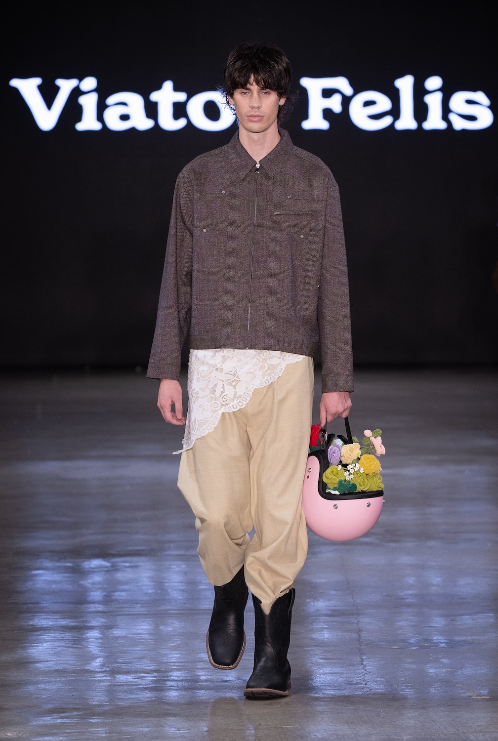 LOS ANGELES, CALIFORNIA - OCTOBER 18: A model walks the runway at the Viator Felis show during Los Angeles Fashion Week Powered By Art Hearts Fashion at The New Mart on October 18, 2025 in Los Angeles, California. (Photo by Mark Gunter/Getty Images for Art Hearts Fashion)