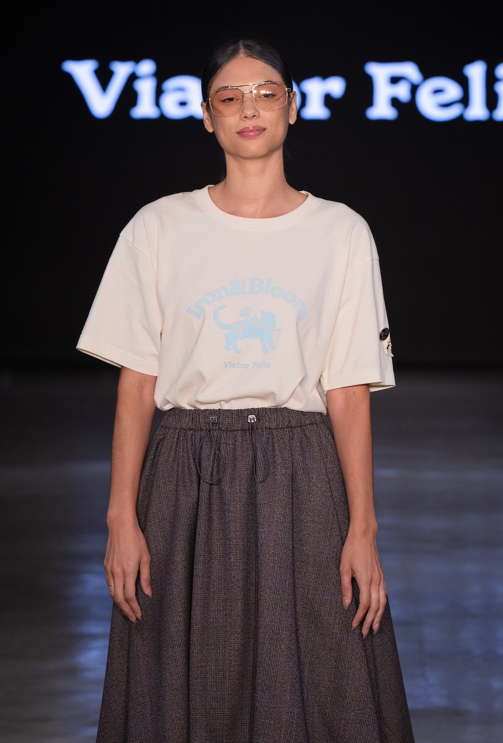 LOS ANGELES, CALIFORNIA - OCTOBER 18: A model walks the runway at the Viator Felis show during Los Angeles Fashion Week Powered By Art Hearts Fashion at The New Mart on October 18, 2025 in Los Angeles, California. (Photo by Mark Gunter/Getty Images for Art Hearts Fashion)