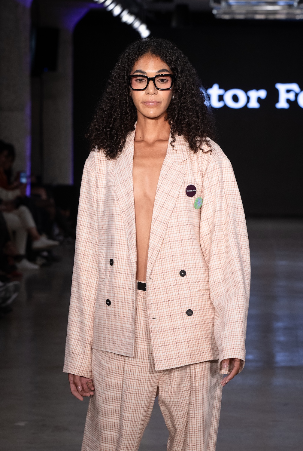 LOS ANGELES, CALIFORNIA - OCTOBER 18: A model walks the runway at the Viator Felis show during Los Angeles Fashion Week Powered By Art Hearts Fashion at The New Mart on October 18, 2025 in Los Angeles, California. (Photo by Mark Gunter/Getty Images for Art Hearts Fashion)