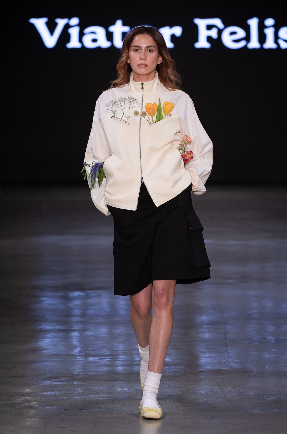 LOS ANGELES, CALIFORNIA - OCTOBER 18: A model walks the runway at the Viator Felis show during Los Angeles Fashion Week Powered By Art Hearts Fashion at The New Mart on October 18, 2025 in Los Angeles, California. (Photo by Mark Gunter/Getty Images for Art Hearts Fashion)