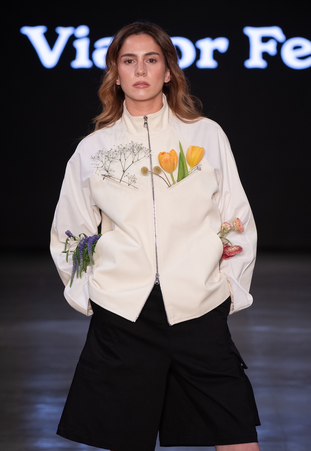 LOS ANGELES, CALIFORNIA - OCTOBER 18: A model walks the runway at the Viator Felis show during Los Angeles Fashion Week Powered By Art Hearts Fashion at The New Mart on October 18, 2025 in Los Angeles, California. (Photo by Mark Gunter/Getty Images for Art Hearts Fashion)